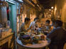 Family dining outside in Old Taipa.