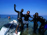 Tourists covered in mud at Dead Sea.