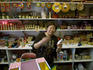 Woman in shop, Chinatown.