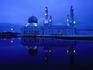 Kota Kinabalu City Mosque at Likas reflected in lagoon at dusk.