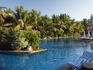 Palm fringed swimming pool at The Kenilworth Hotel, Utorda Beach.