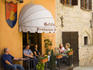 People stop for coffee, Aries Cafe.