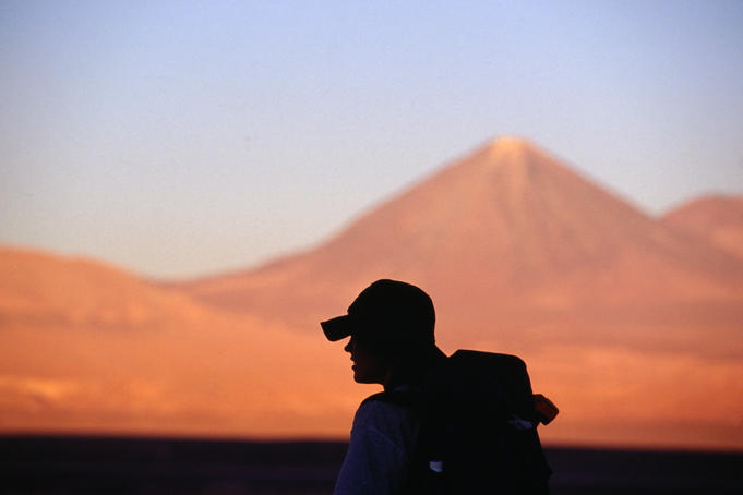 Hiking through the Atacama desert landscape.