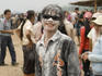 Young people covered in white powder and black paint during Pi Mai Lao ( Lao New Year), Don Sai Mung Khun.