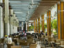 Outdoor cafes at Suria KLCC shopping complex.