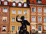 Bronze statue of Warsaw Mermaid in old town sqaure.