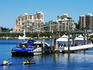 Kayakers and City Cat on Brisbane River.