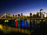 Story Bridge and city skyline at night.