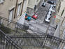 Crooked stairs to street below.