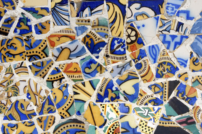 Detail of Banc de Trencadis - a curved tiled bench on Sala Hipostila, Parc Guell.