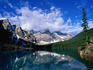 Moraine Lake surrounded with mountains and forests.