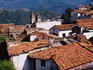 Red tiled rooftops and cathedral.