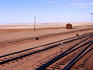 Train tracks and barren countryside from Trans-Mongolian train.