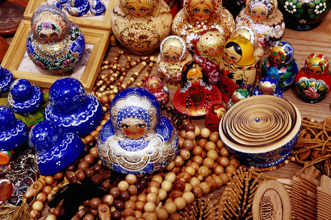 Matryoskha dolls & wooden beads for sale at souvenir market on waterfront in Listvyanka village on Lake Baikal.