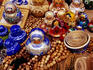 Matryoskha dolls & wooden beads for sale at souvenir market on waterfront in Listvyanka village on Lake Baikal.