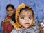 Portrait of mother and baby girl.