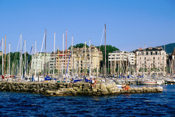 Stone wall sheltering yachts on Lake Geneva (Lac Leman).