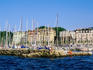 Stone wall sheltering yachts on Lake Geneva (Lac Leman).