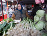 Woman selling leeks, cabbages and silver beet at Green Market, Central Belgrade.