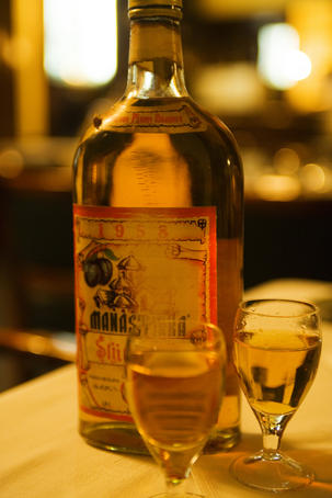 Serbian plum brandy rakija on table at Writer's Club restaurant