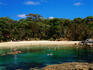 People swimming, Honeymoon Bay near Currawong.