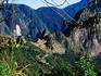 Ruins of Machu Picchu with Huayna Picchu in background, seen from end of Inca Trail.