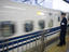 Employee monitors shinkansen bullet train, Nagoya