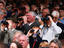 Crowd with binoculars at Galway Races.