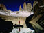 Reflection of hiker beneath Torres del Paine on 