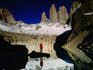 Reflection of hiker beneath Torres del Paine on 