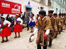 Locals in traditional dress in street parade
