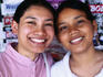 Local sisters smiling.