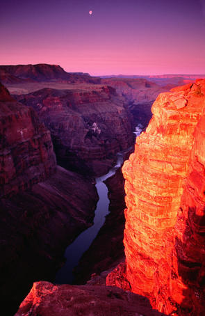 Toroweap Overlook at sunrise with moon over Colorado River.
