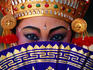 Legong dancer with traditional fan 'kipas'.