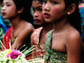 Girls dressed in traditional costume at school carnival.