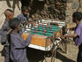 Children playing table football.