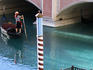 Woman rowing gondola in replica of Venice canal, Las Vegas.