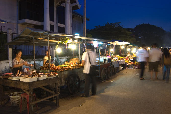 People shopping at a night market.