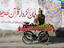 Selling fruit along the Karakoram Highway.