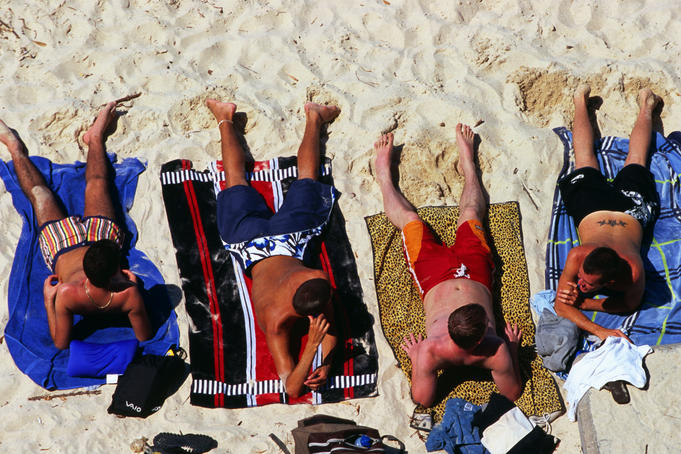 Sunbathers on Bondi Beach.