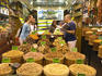 Tourists buying nuts at Misir Carsisi Spice Bazaar.