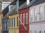 Red, yellow and blue houses.