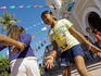 Children playing in village square.