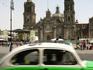 Taxi passing Palacio Nacional.