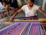 Villager weaving in Suai Loro village.