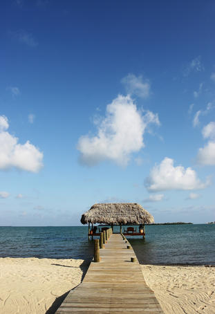 Thatched shelter at end of jetty.