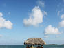 Thatched shelter at end of jetty.