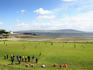 Soccer game by the coast.