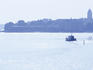 Boat sailing towards Suomenlinna, Sveaborg island in early morning.