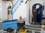 Man and woman outside house, Mykonos, Cyclades Islands.